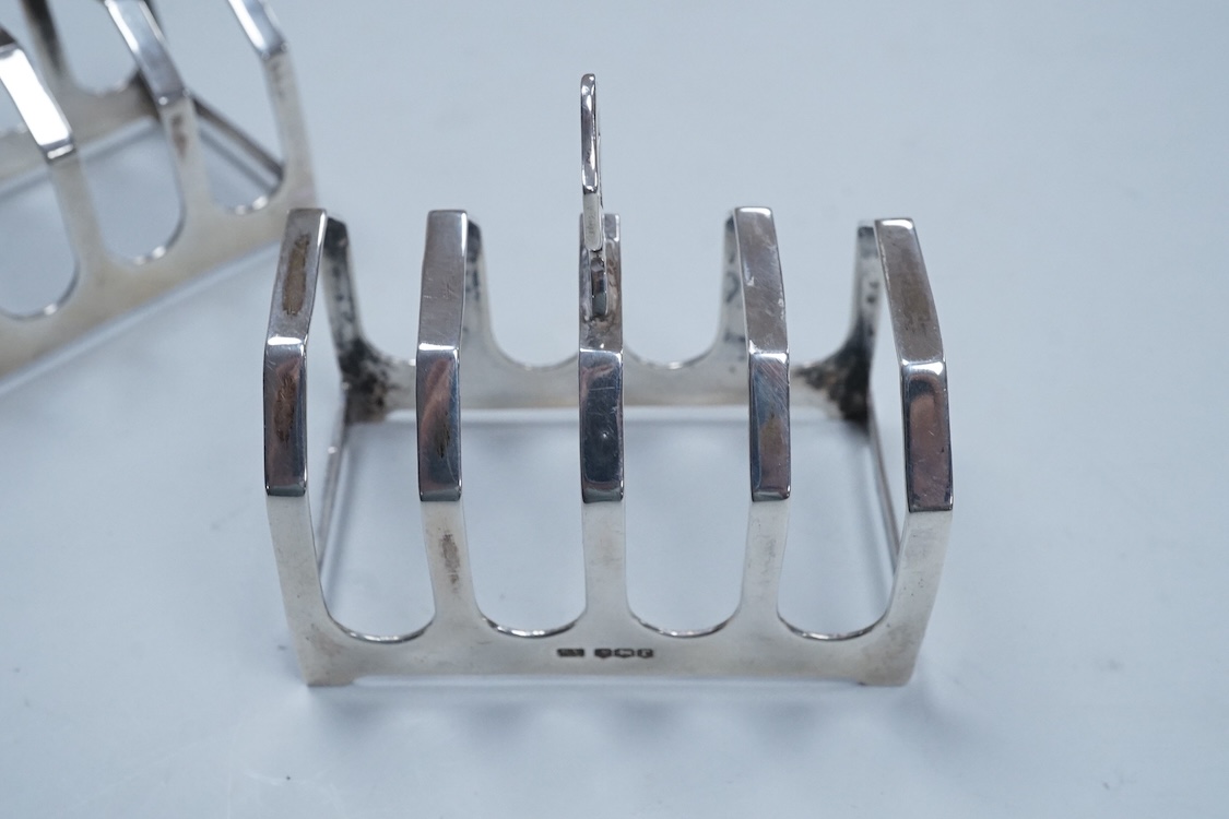 A pair of George V silver five bar toast racks, Viners Ltd, Sheffield, 1934, 75mm, 3.6oz.